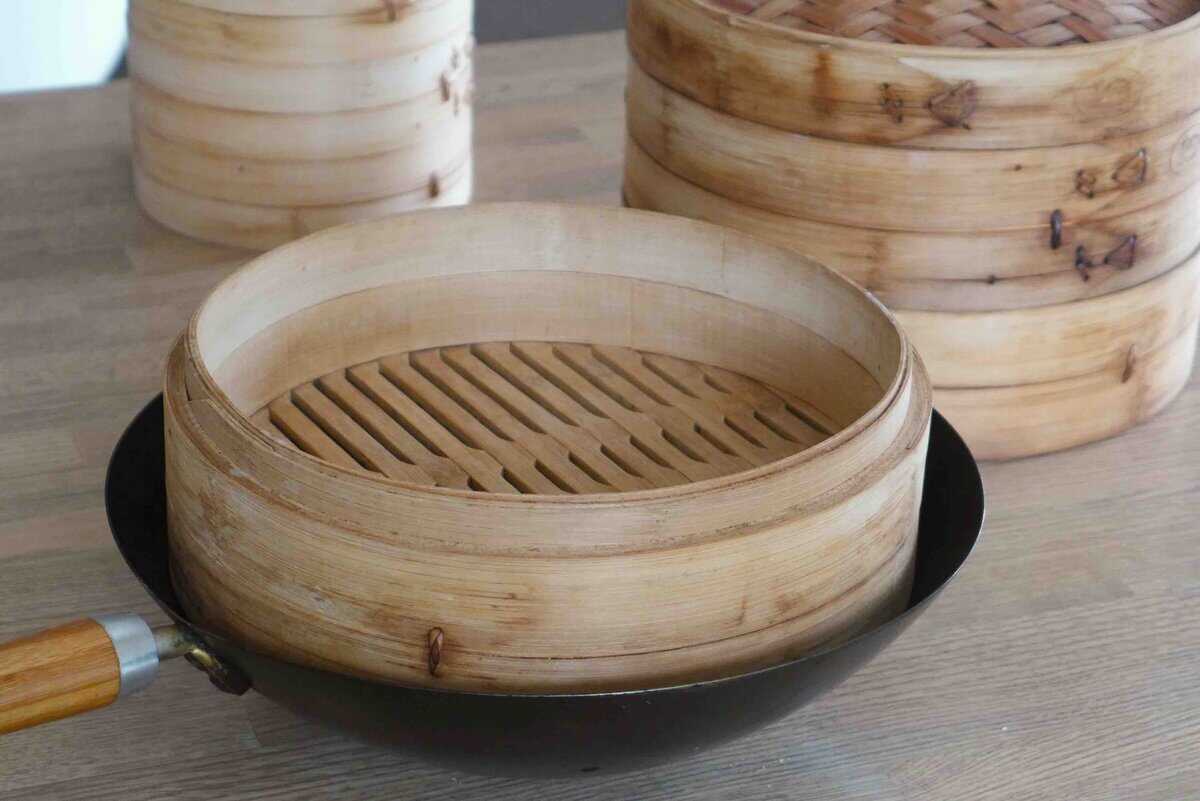 bamboo steamer in a wok.