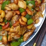 a plate of cashew chicken stir-fry.