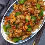 a plate of cashew chicken stir-fry.