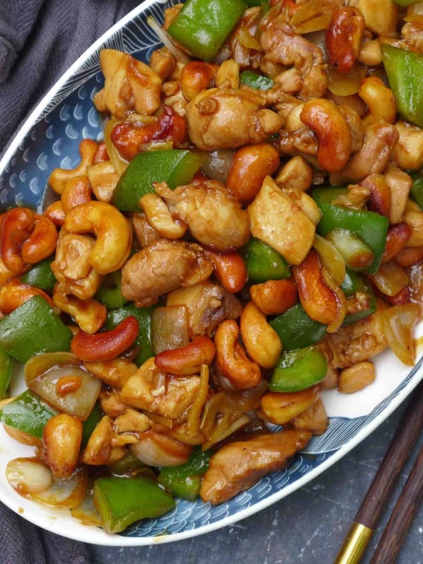 a plate of cashew chicken stir-fry.