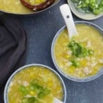 two bowls of chicken corn soup.