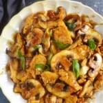 chicken and mushroom stir-fry on a plate.