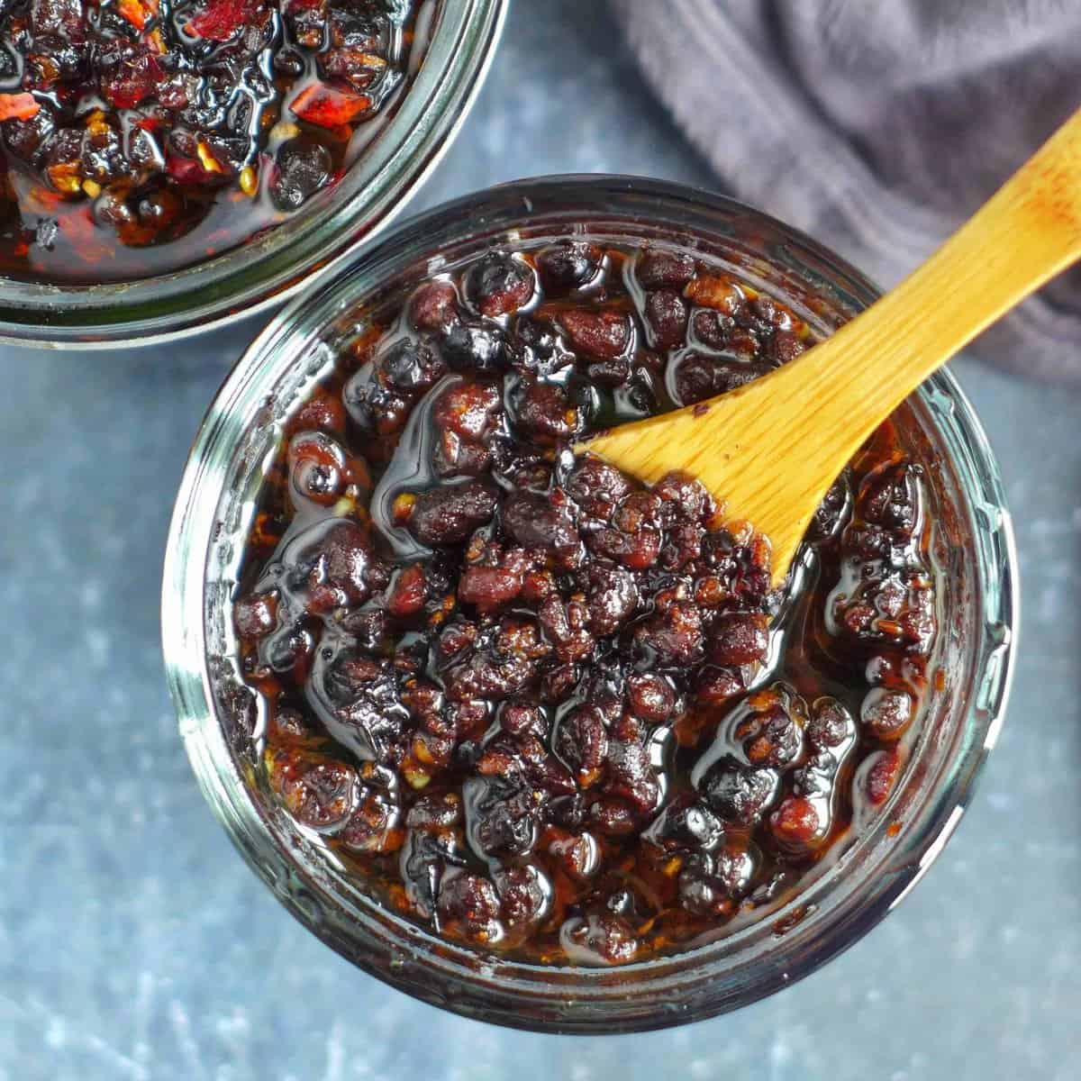 black bean sauce with a spoon.