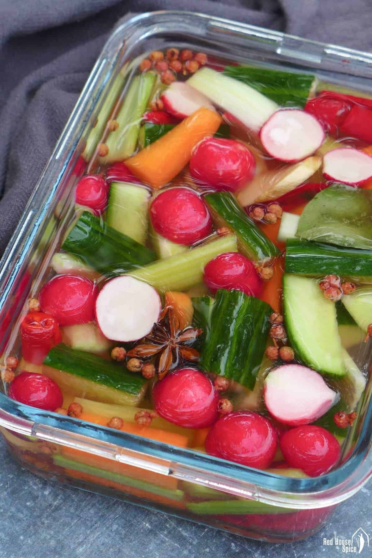 Chinese overnight pickled vegetables inside a container.