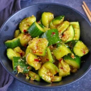 smashed cucumber pieces with dressing
