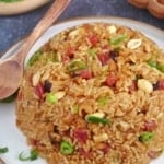 Chinese sticky rice with sausage, mushroom and peanuts.