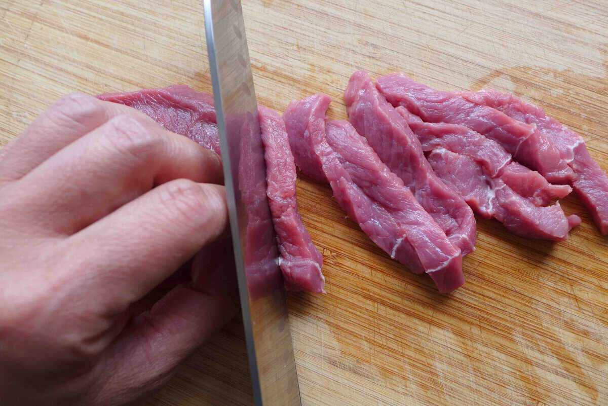 cutting beef steak.