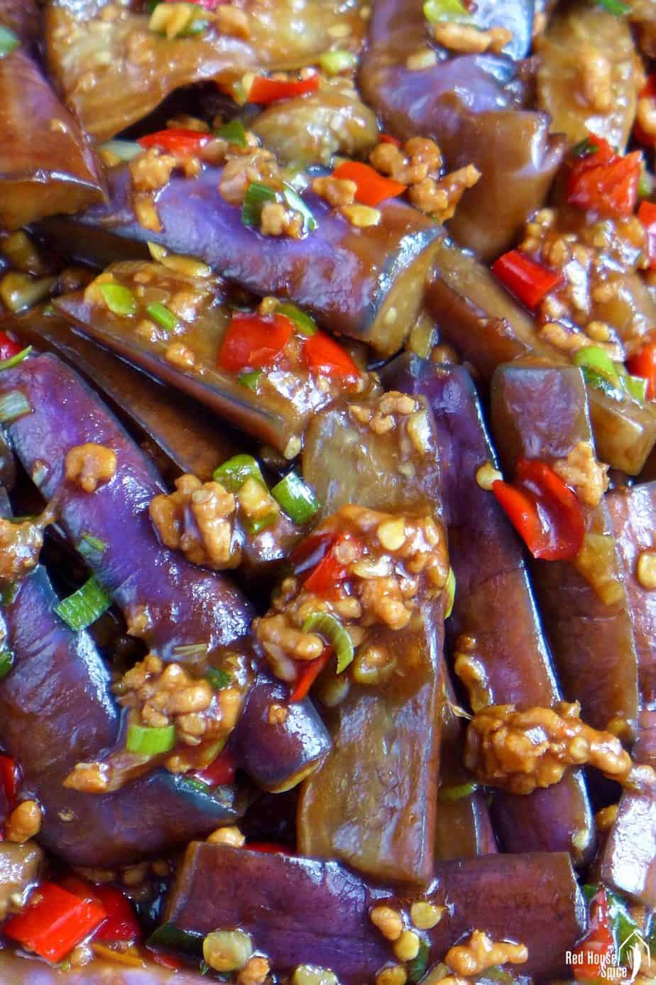 Eggplant pieces covered with minced meat and a thick sauce