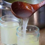 pouring stock into a jar with overlay text that says homemade chicken stock.