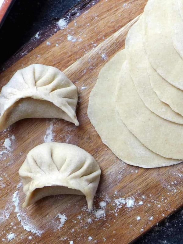 dumpling wrappers and two dumplings