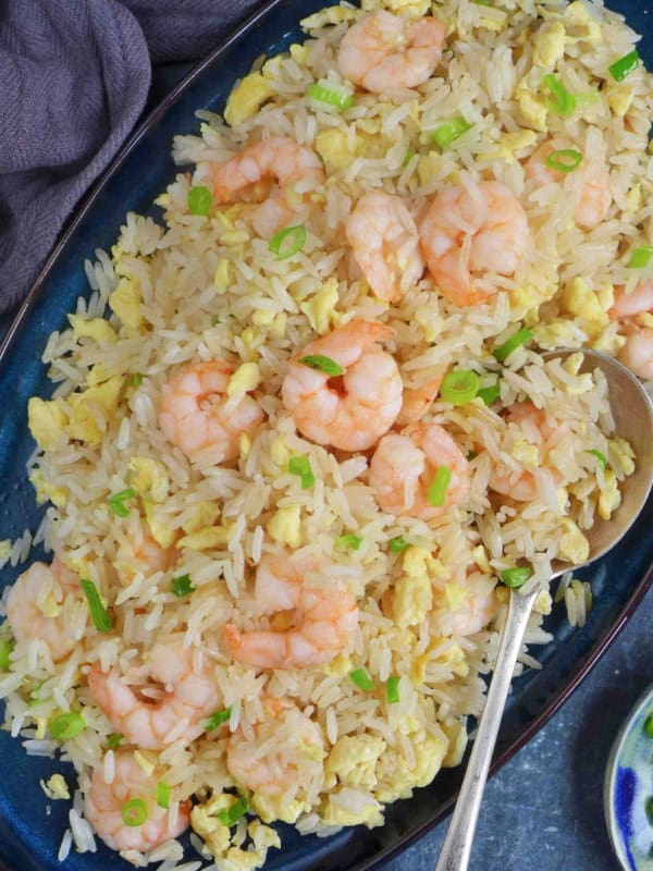 shrimp fried rice on a plate.