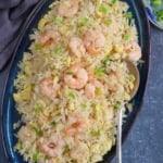 shrimp fried rice on a plate.