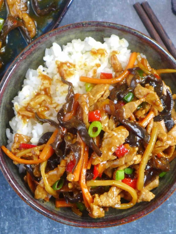 Sichuan Shredded Pork with garlic sauce over rice in a bowl.