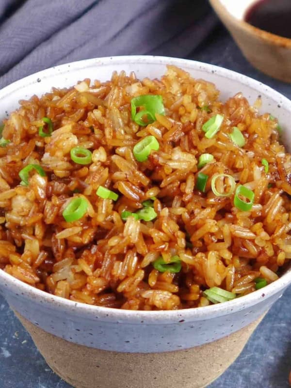 Chinese soy sauce fried rice in a bowl.