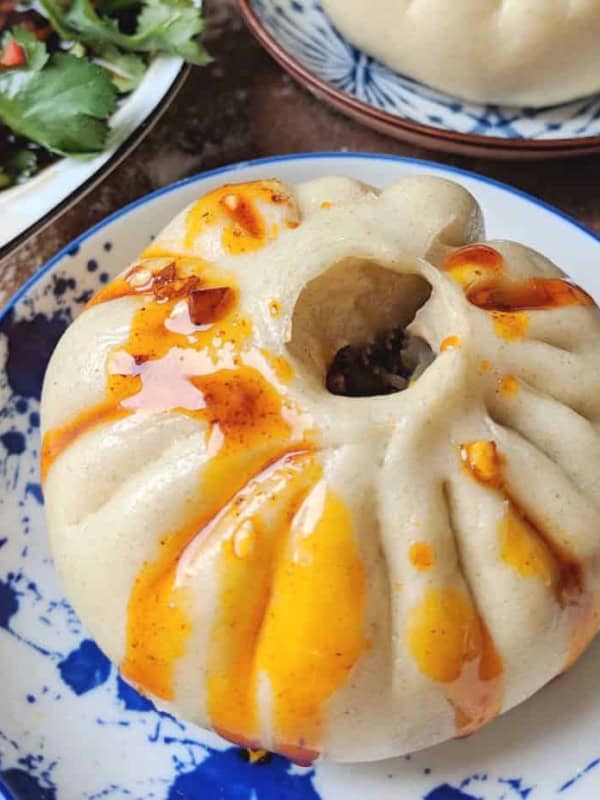 A steamed bao buns dressed with chilli oil