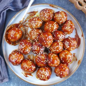 Chinese sweet and sour meatballs on a plate.