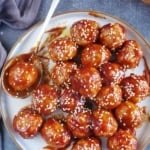 Chinese sweet and sour meatballs on a plate.