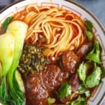 Taiwanese beef noodle soup with overlay text that says beef noodle soup.