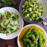 Three plates of cucumber salads