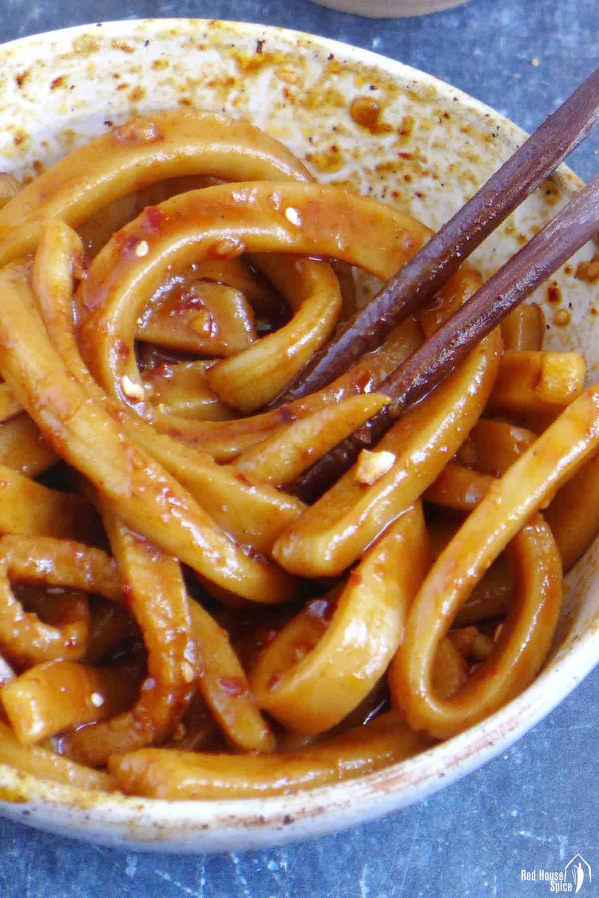 A bowl of Tian Shui Mian with thick sauce.