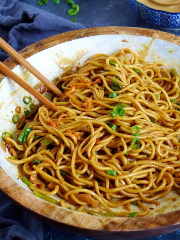 Hot dry noodles with sesame paste dressing and scallions